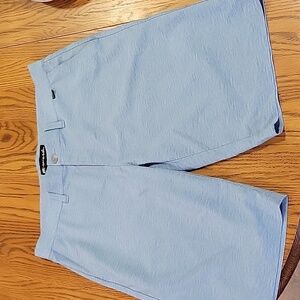 Travis Mathew blue shorts